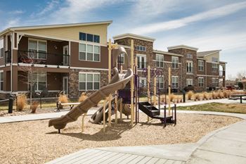 community playground |at Ridge at Thornton Station Apartments, Colorado